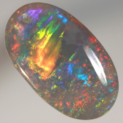 SOLID SEMI BLACK OPAL Quality opal rolling flashes of rainbow fire over sparkles. With VIDEO